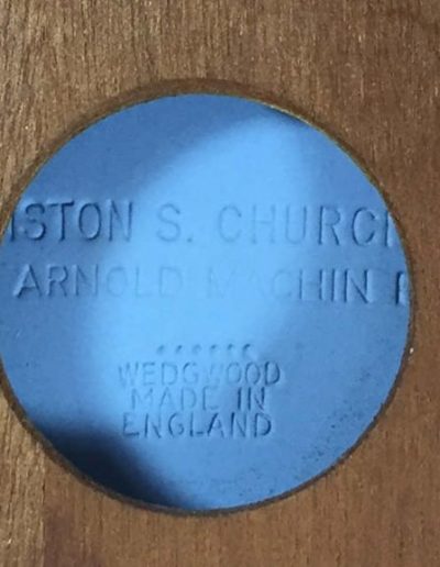 Cutout in frame to allow imprinted text on back of Wedgwood to be read