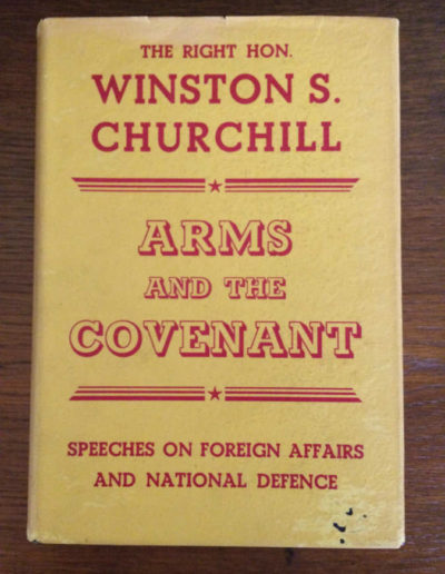 Winston Churchill’s book – Arms and the Covenant in yellow dust jacket in mylar protective sleeve