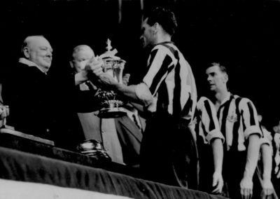 Press Photo: Churchill Hands Trophy to Newcastle Soccer Captain Harvey, 1952